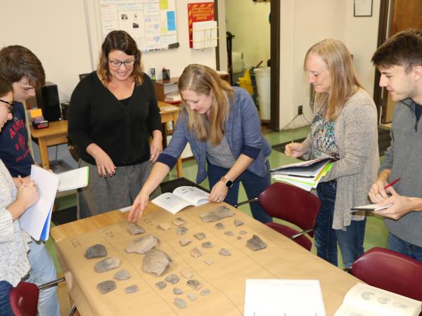 archaeology staff around table