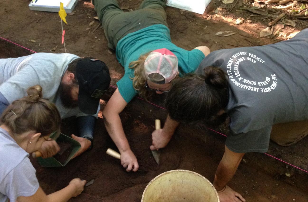 Students Working Together to Excavate a Feature