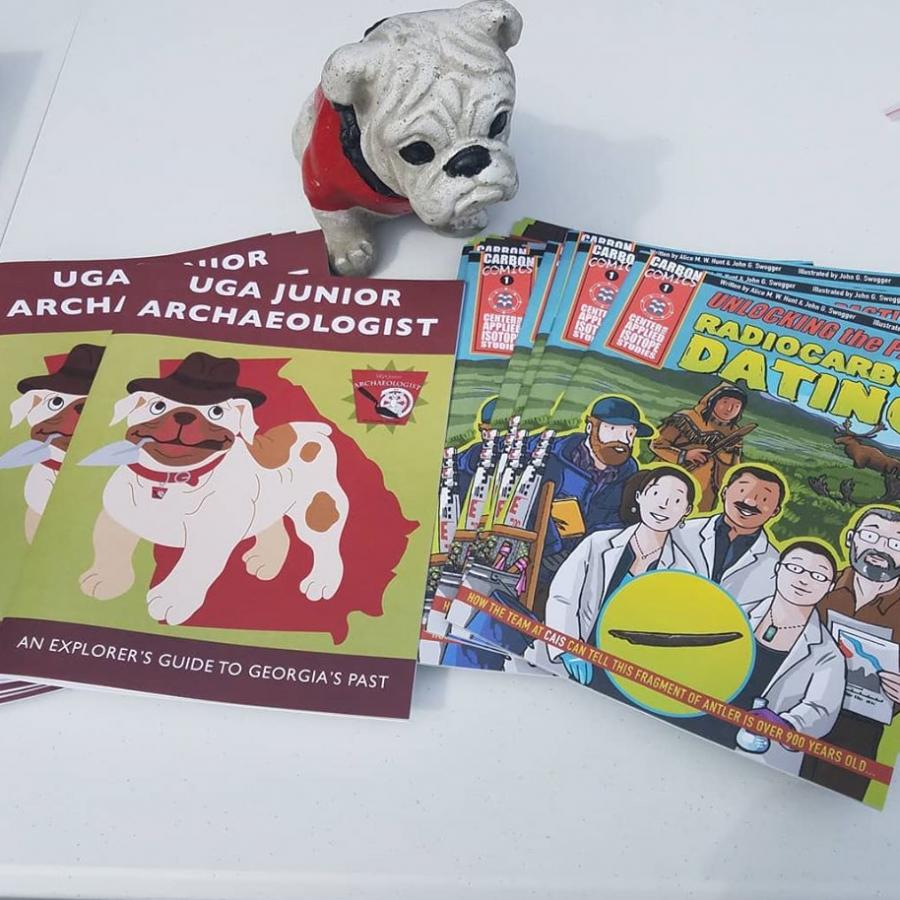 image showing the uga junior archaeologist workbook and carbon comics